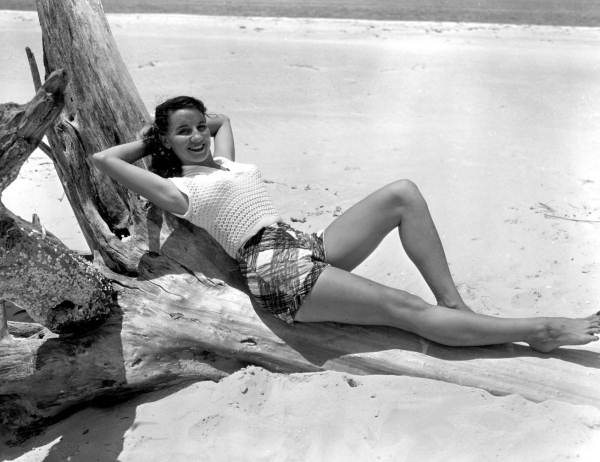 Ruth Hall poses on the beach on Saint George Island.