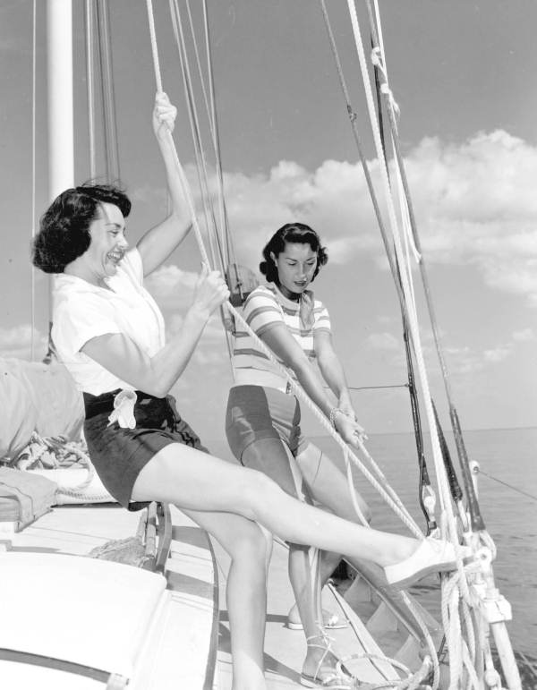 Two women raising the sails of the "Tropicair" - Saint Petersburg, Florida