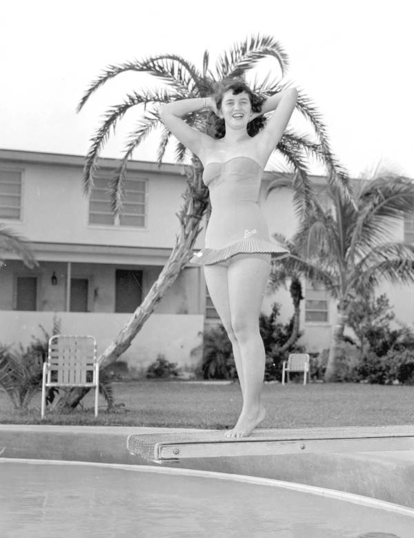 Peggy Landers posing on diving board