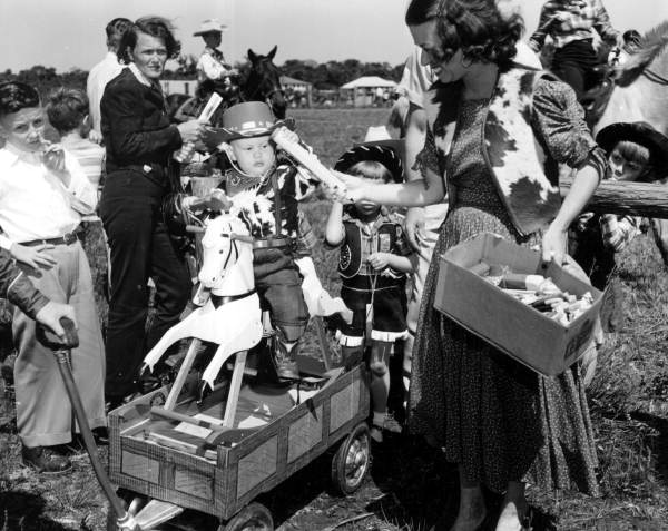 Unidentified boy receiving his prize - New Smyrna Beach, Florida.