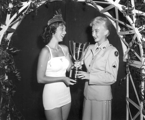 The newly crowned Miss New Smyrna Beach, Gayle Hester, receiving her trophy - New Smyrna Beach, Florida