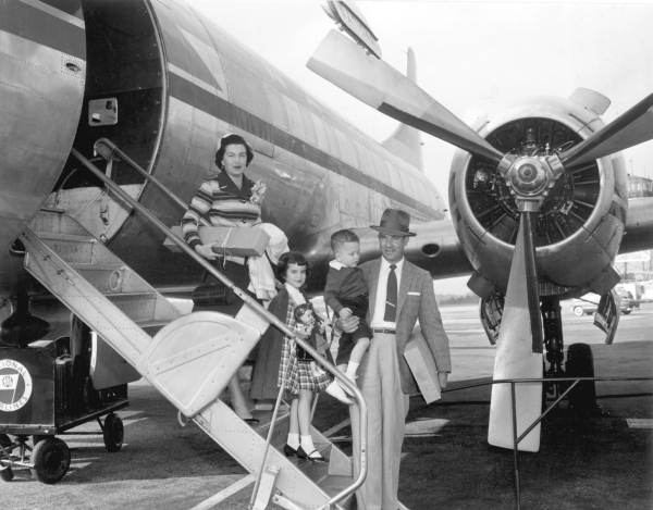 "The all-Florida family" exiting a plane at the Florida Products Festival