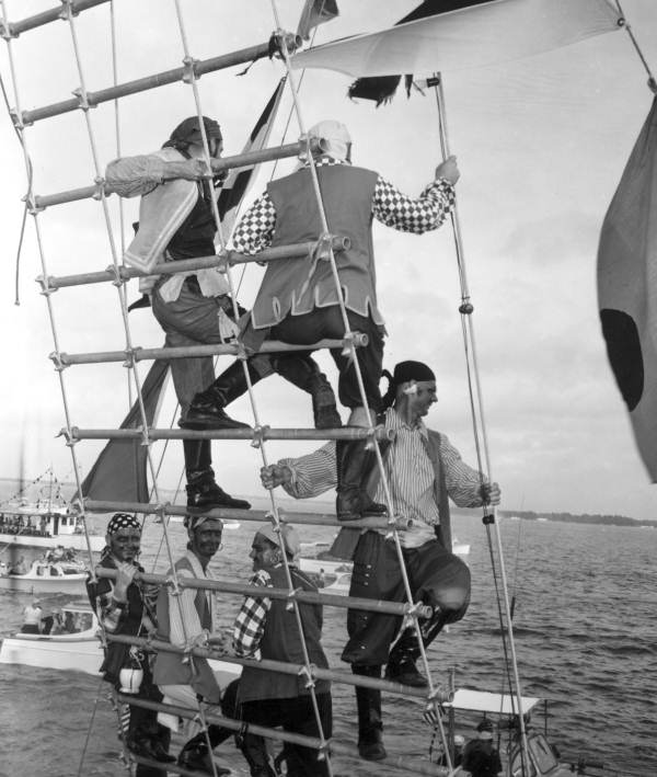 Pirates on the ratline of a ship at the Gasparilla festival - Tampa, Florida.