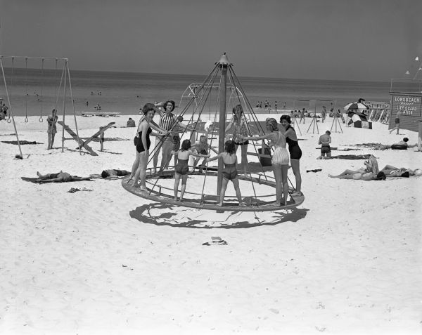 Riding the merry-go-round at Long Beach Resort - Panama City Beach.