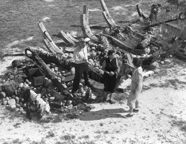 Arthur and Gay McKee with sightseer outside the McKee's Museum of Sunken Treasure - Plantation Key, Florida