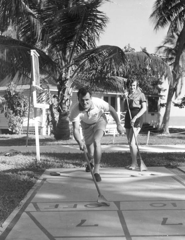 Lyn and Jim Agramonte playing shuffleboard during their honeymoon - Sanibel Island, Florida.