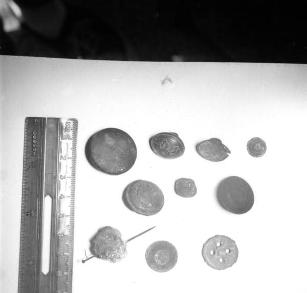 Buttons and needle on display at McKee's Museum of Sunken Treasure - Plantation Key, Florida