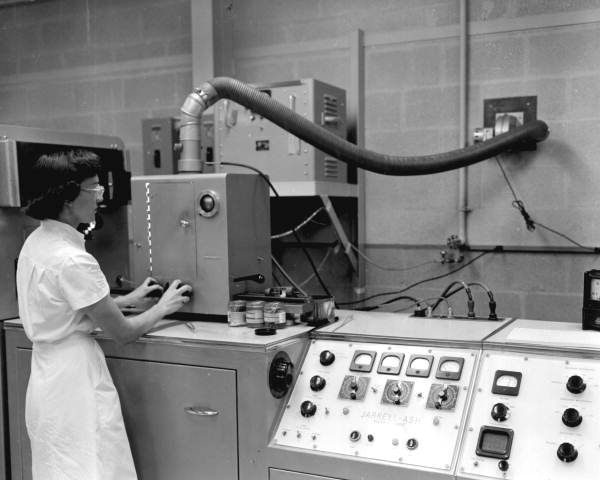 Lab technician, Tommie Wise, working at the Columbia-National Corp., chemical plant - Pace, Florida