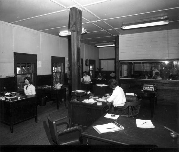 Secretaries work in the offices at Camp Blanding .