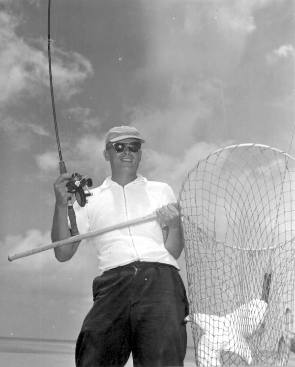 Richard Younger proudly displaying his small shark catch :