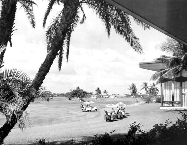 Golfers in their golf carts on the golf course - Hollywood, Florida