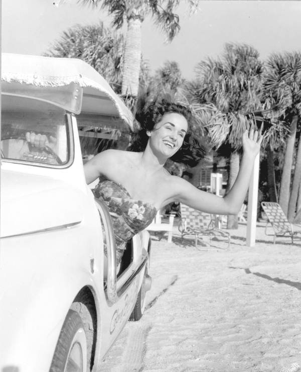 Gail Courtney waves from a car - Sarasota, Florida.