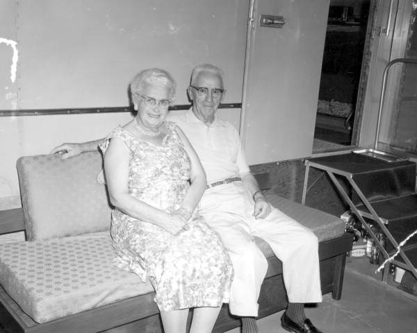 Mr. and Mrs. Ray Vinton relax on sofa at their trailer - Fort Pierce, Florida .