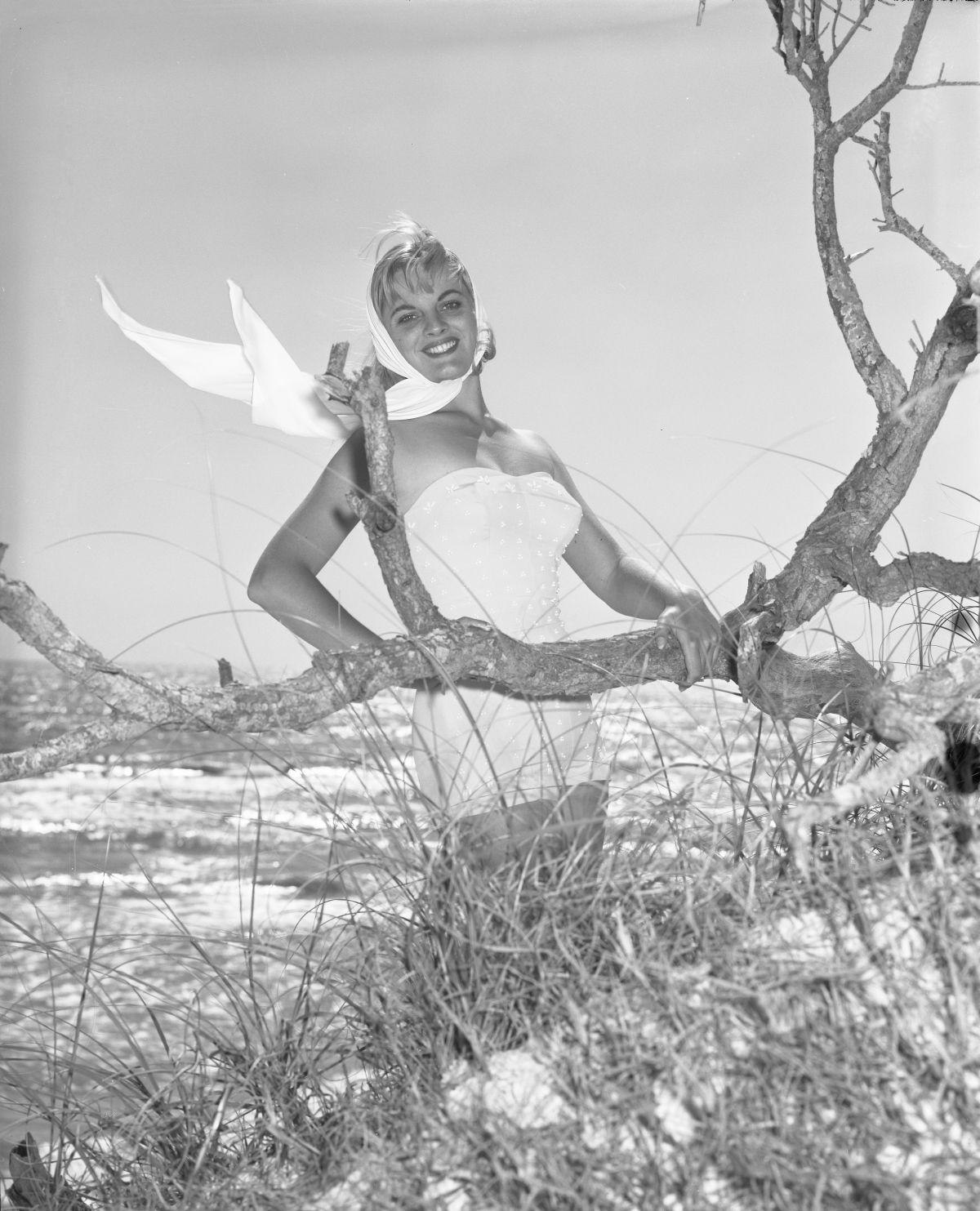 Penny Buzzard poses in a bathing suit at Saint Andrews State Park.