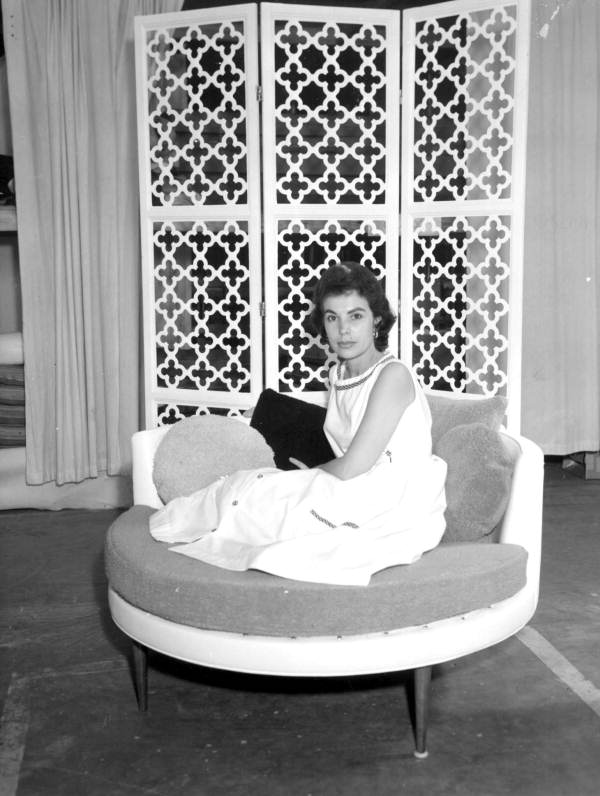 Mercedes Ficarrotta models a chair - Tampa, Florida .