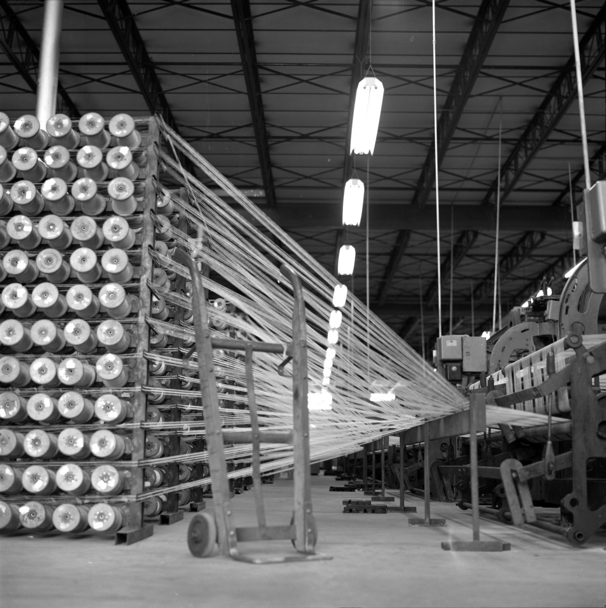 Machines weaving plastic webbing - Hialeah, Florida .