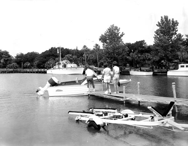 Family preparing to board boat for excursion from Apalachicola to Pensacola.