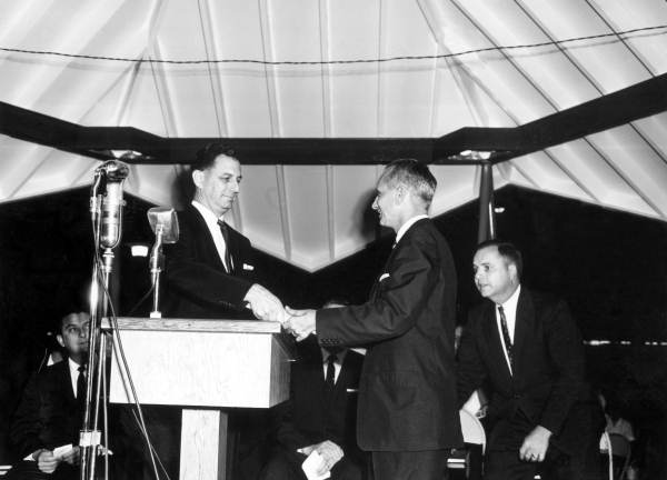 Men gathered for the dedication of a fountain in the center of town - Lakeland, Florida