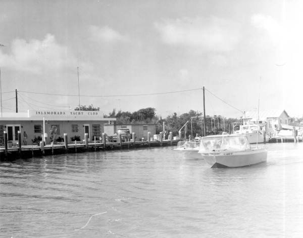 Boats float in front of the Islamorada Yacht Club