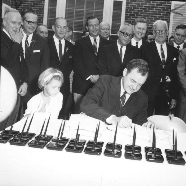Governor Claude Kirk signing the Disney bill at the Governor's mansion - Tallahassee, Florida.