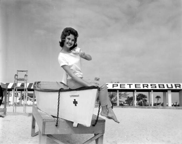 Cheryle Aurland posing on a lifeboat - Saint Petersburg Beach, Florida.