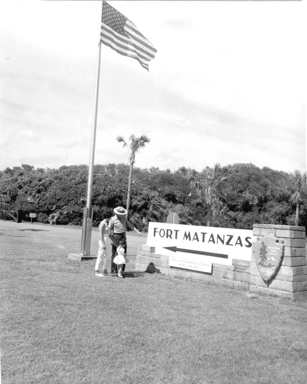 Ranger Ed Kent tells a mother and daughter the way to Fort Matanzas