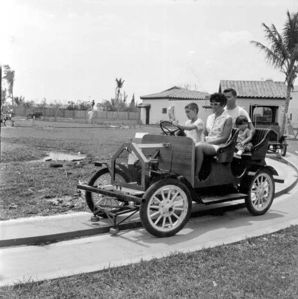 People seated in a ride at Pirates World - Dania, Florida