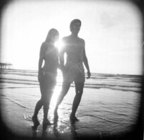 Couple holding hands on Cocoa Beach