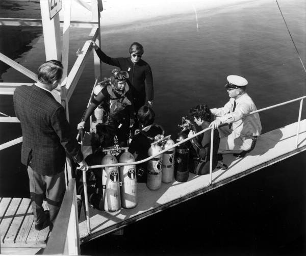 Scuba divers prepare to go diving - Panama City, Florida