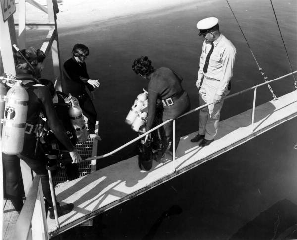 Scuba divers prepare to go diving - Panama City, Florida