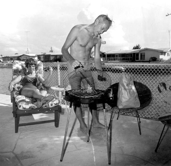 Couple outside with their grill - Cocoa Beach, Florida
