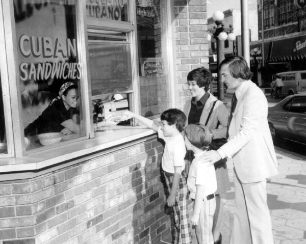 Family ordering takeout at an Ybor City restaurant - Tampa, Florida.