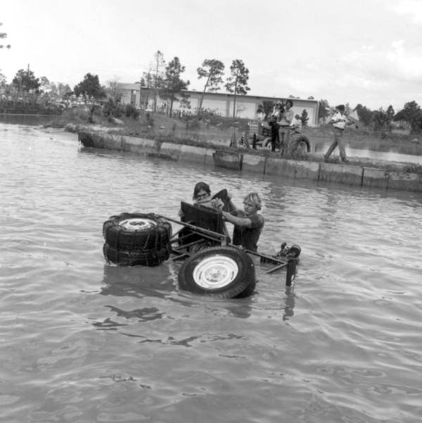 Overturned swamp buggy in Naples' Swamp buggy race - Naples, Florida