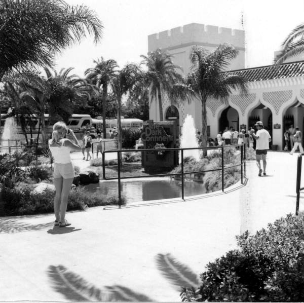 Tourists taking pictures at the entrance to Busch Gardens - Tampa, Florida