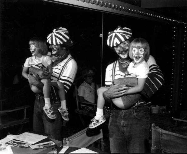Clown holding child - Polk County, Florida