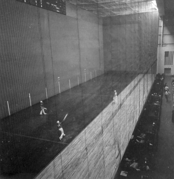 Jai alai players play at a jai alai frontons - Quincy, Florida .