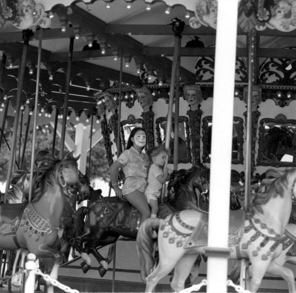 Children riding merry-go-roundPolk County, Florida