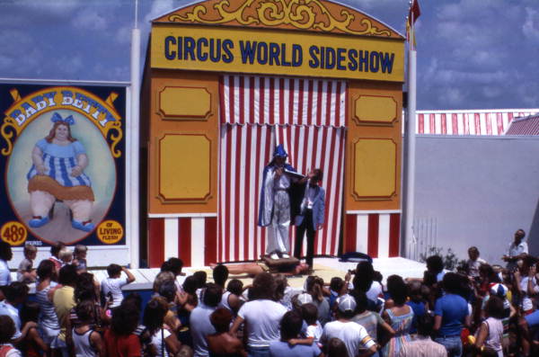 Crowd watching the Circus World theme park sideshow performance - Orlando, Florida.