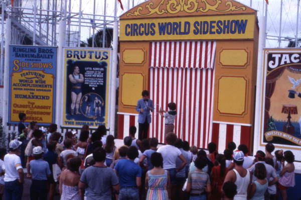 Crowd watching the Circus World theme park sideshow performance in Orlando, Florida.