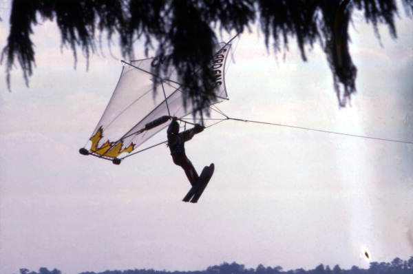View showing an employee parakiting at the Cypress Gardens theme park in Winter Haven, Florida.