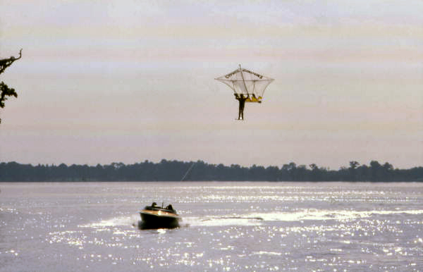 View showing an employee parakiting at the Cypress Gardens theme park in Winter Haven, Florida.