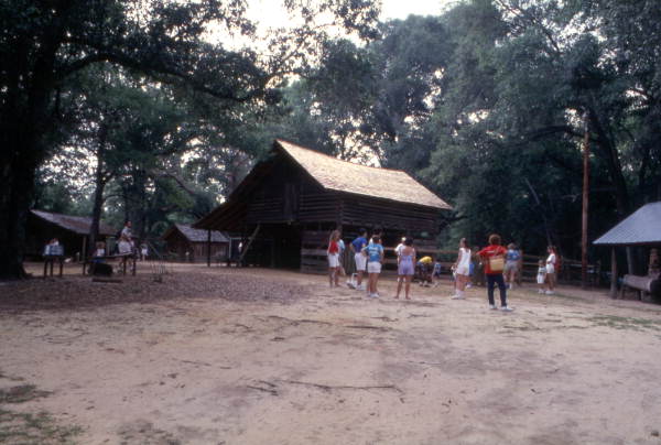 Visitors looking at farm buildings at the Tallahassee Jr. Museum.
