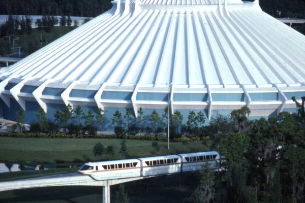 View showing monorail passing by the Space Mountain roller coaster at the Magic Kingdom amusement park in Orlando, Florida.