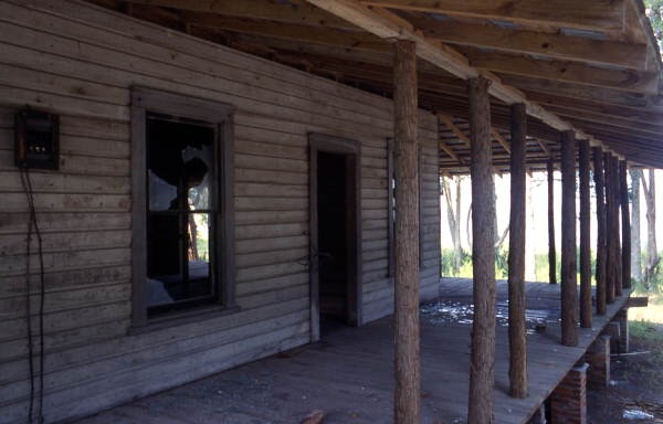 Close-up view showing porch of an abandoned building at the fishing village of Aripeka, Florida.