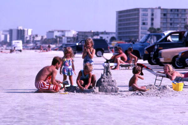 Children making sandcastles at Daytona Beach.