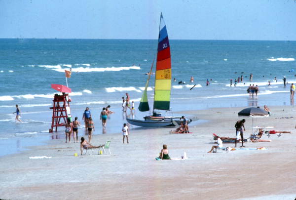 View showing visitors and catamaran at Daytona Beach.