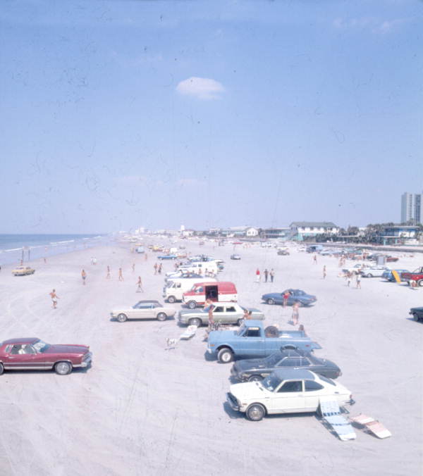 Bird's eye view of people and cars at the beach - Jacksonville, Florida
