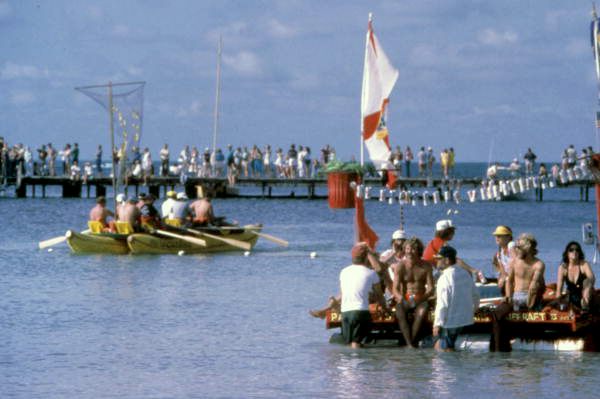 Participants of the first annual Key West Raft Race leaving Monroe Beach - Key West, Florida.