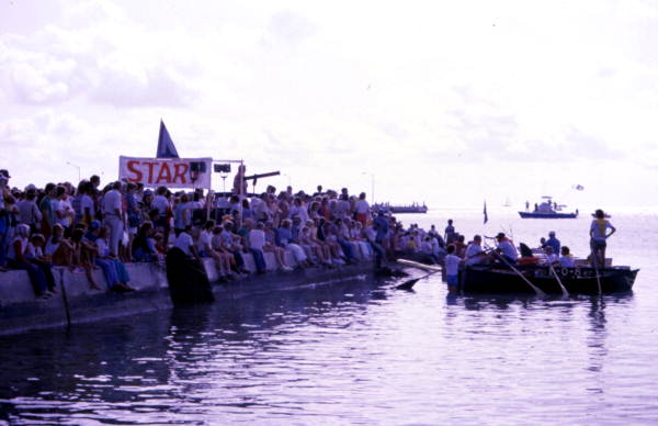 First annual Key West Raft Race participants leaving Monroe Beach - Key West, Florida.