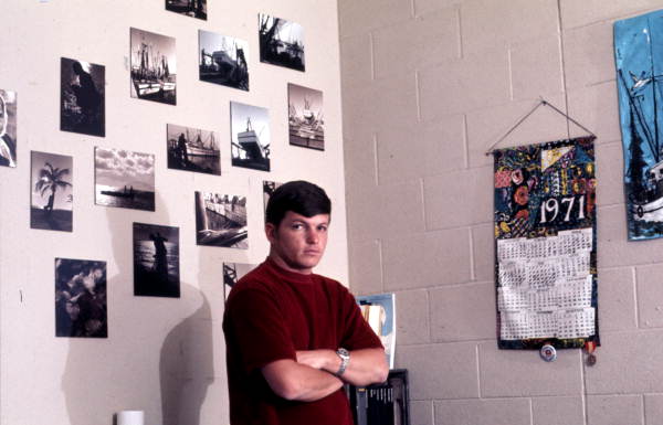 Sergeant 2nd Class Dale M. McDonald, base photographer, in his barracks room.